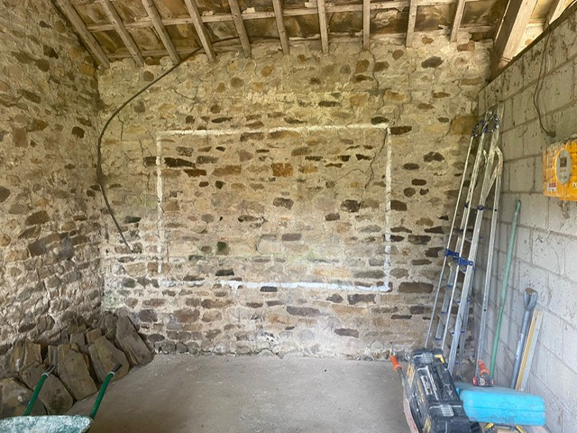 Image of area renovated and installation of log burner Hot Tub.