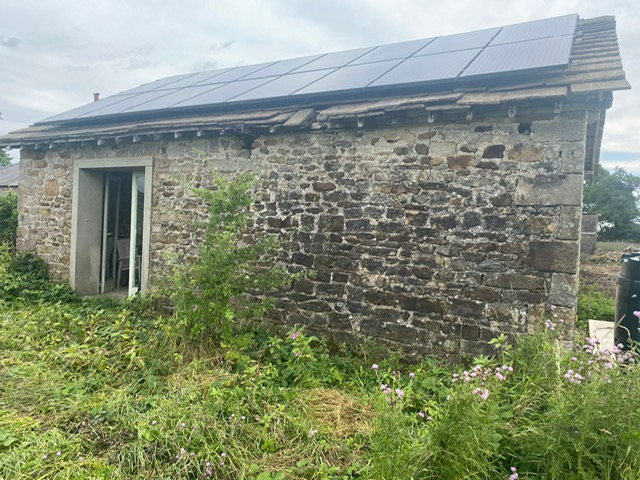 Image of area renovated and installation of log burner Hot Tub.