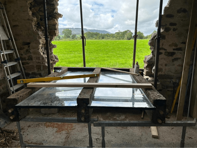 Image of area renovated and installation of log burner Hot Tub.